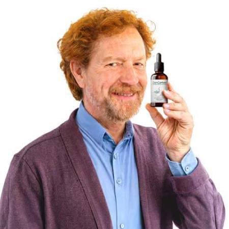 Satisfied ZenCortex user holding the supplement and sharing positive hearing support results